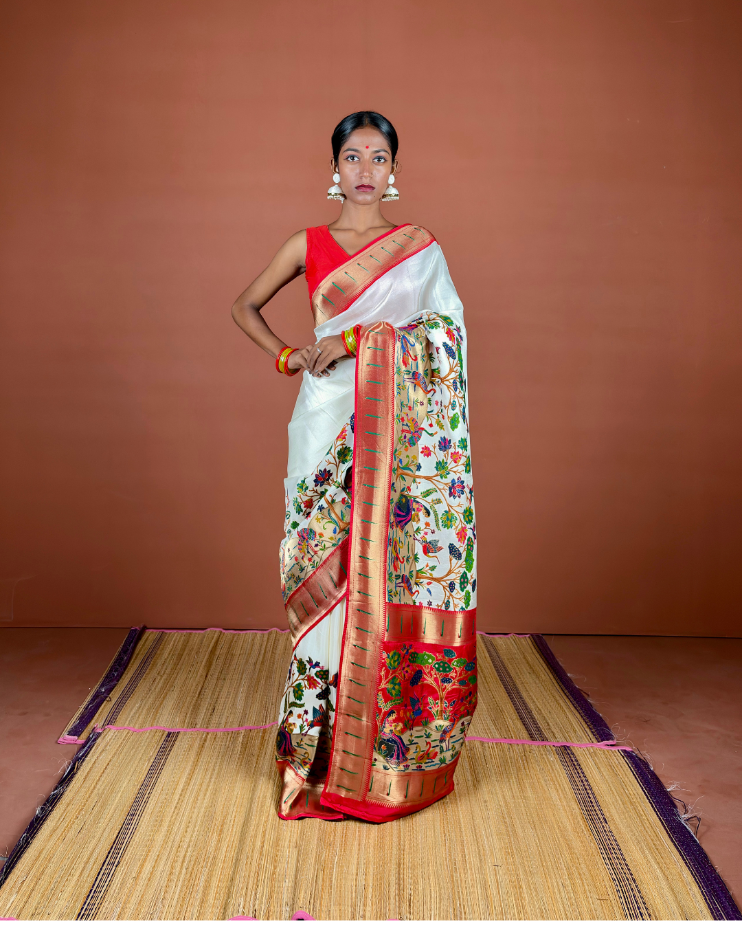 Ivory Banarasi Silk Saree with Multicolor Meenakari and Red Zari Border
