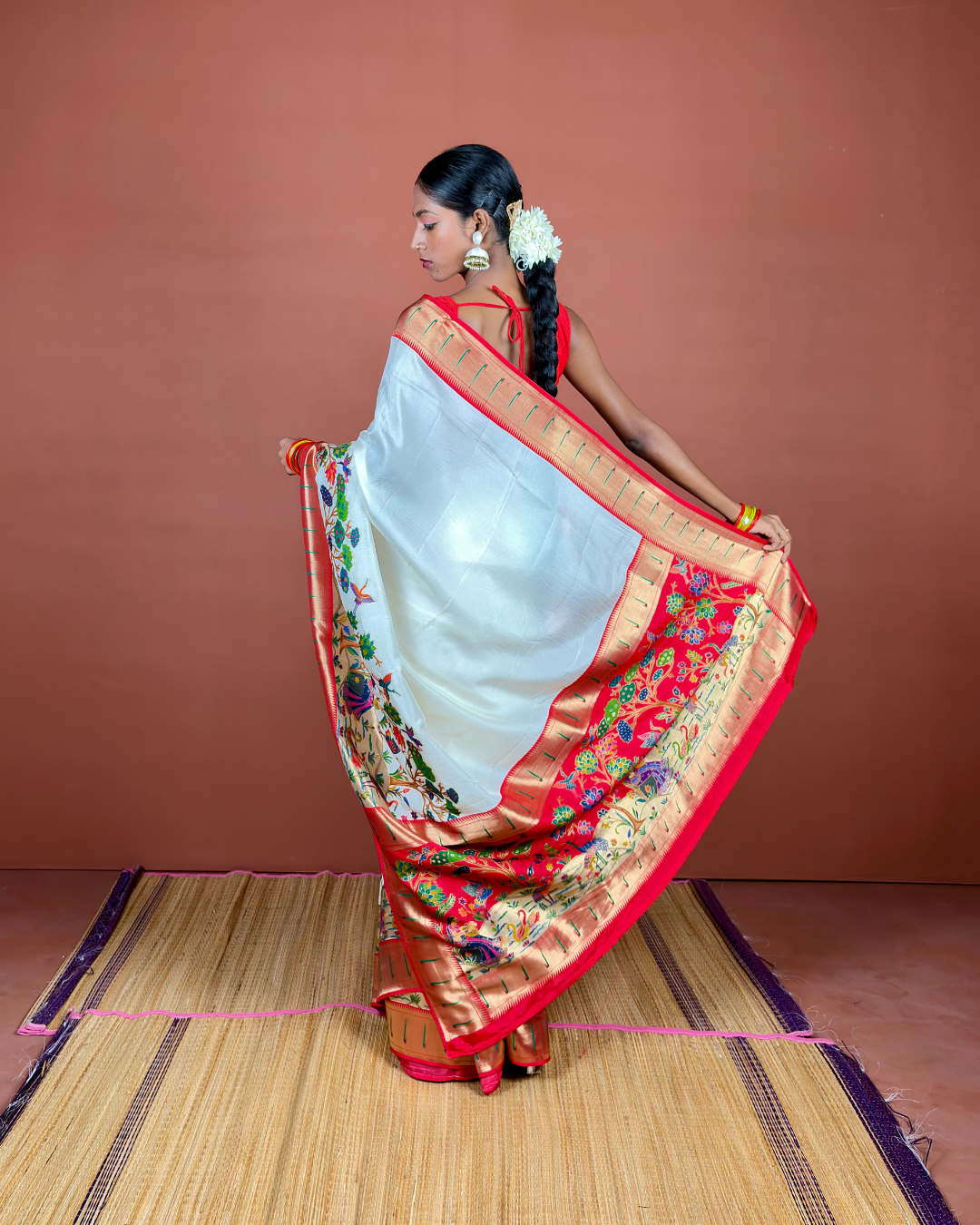 Ivory Banarasi Silk Saree with Multicolor Meenakari and Red Zari Border