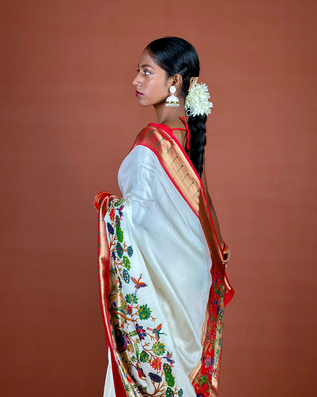 Ivory Banarasi Silk Saree with Multicolor Meenakari and Red Zari Border