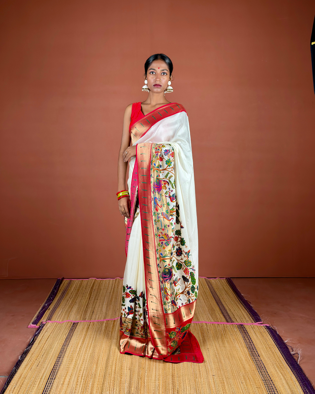 Ivory Banarasi Silk Saree with Multicolor Meenakari and Red Zari Border
