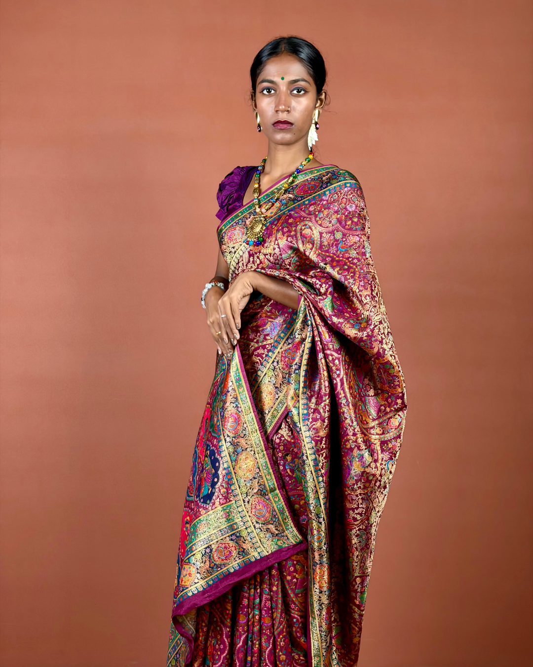Maroon Banarasi Silk Saree with Gold Zari Jaal and Emerald Border