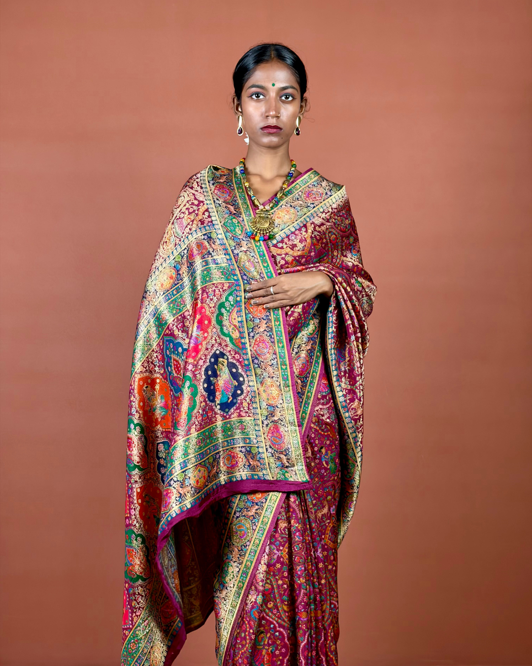 Maroon Banarasi Silk Saree with Gold Zari Jaal and Emerald Border