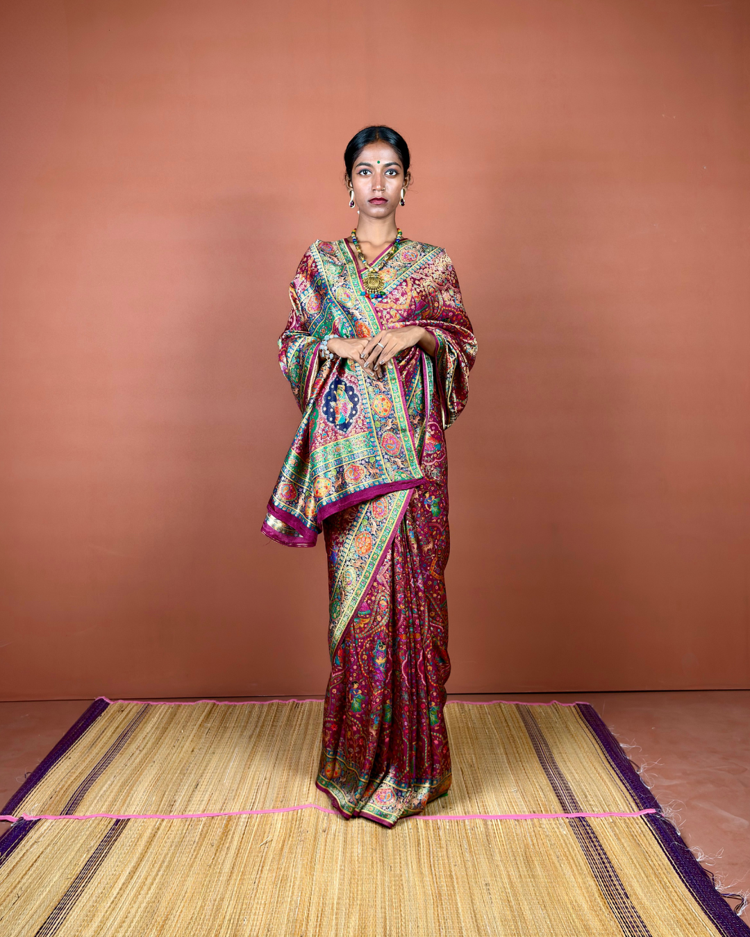 Maroon Banarasi Silk Saree with Gold Zari Jaal and Emerald Border