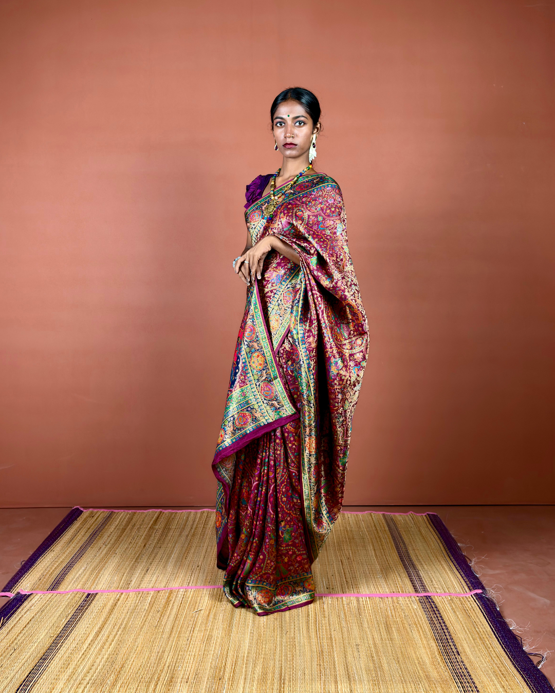 Maroon Banarasi Silk Saree with Gold Zari Jaal and Emerald Border
