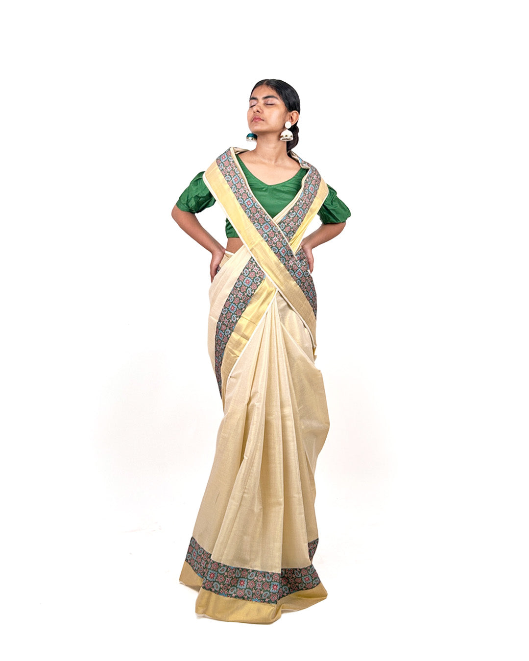 Kerala Kasavu Saree with Teal Ajrak-Inspired Border