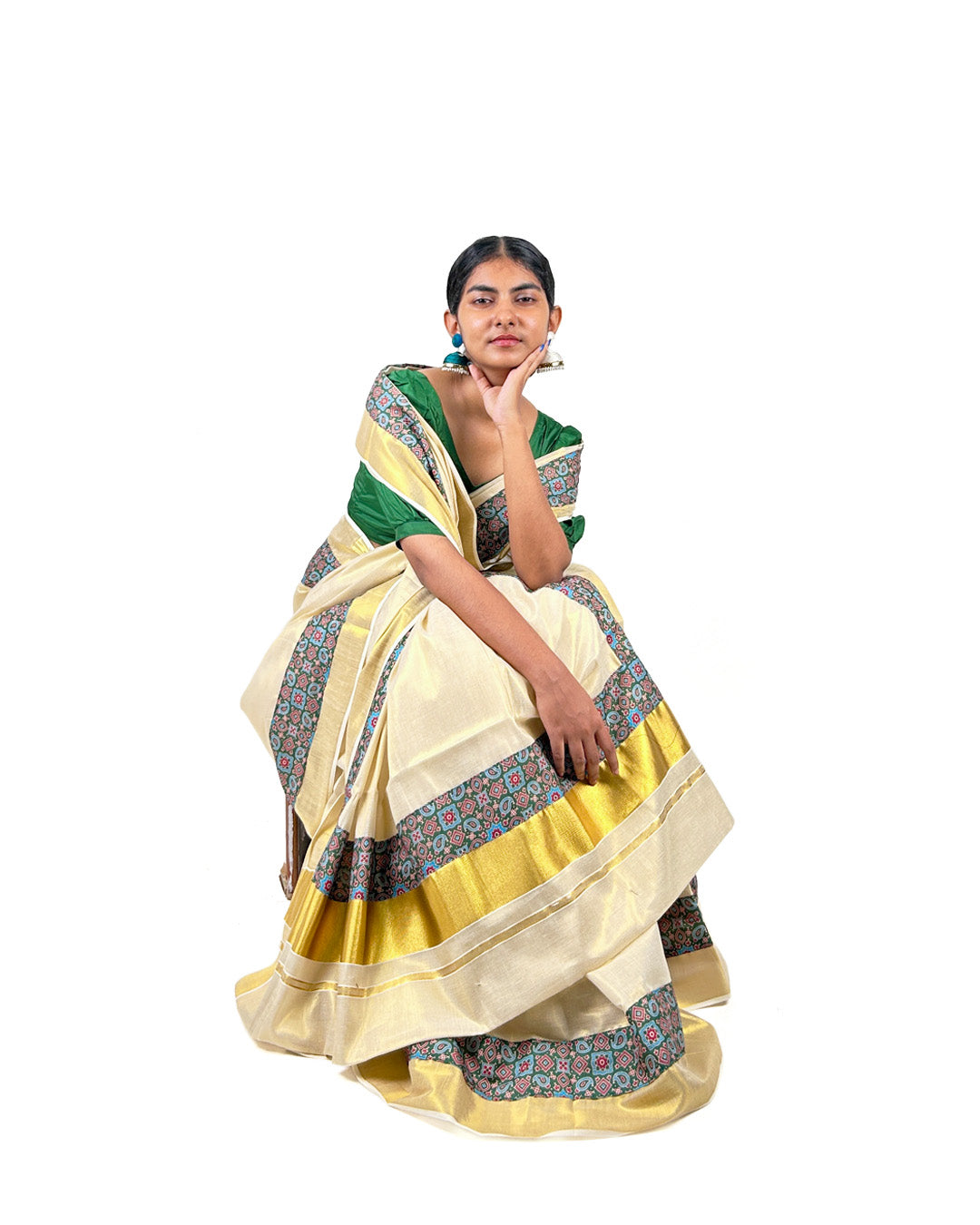 Kerala Kasavu Saree with Teal Ajrak-Inspired Border