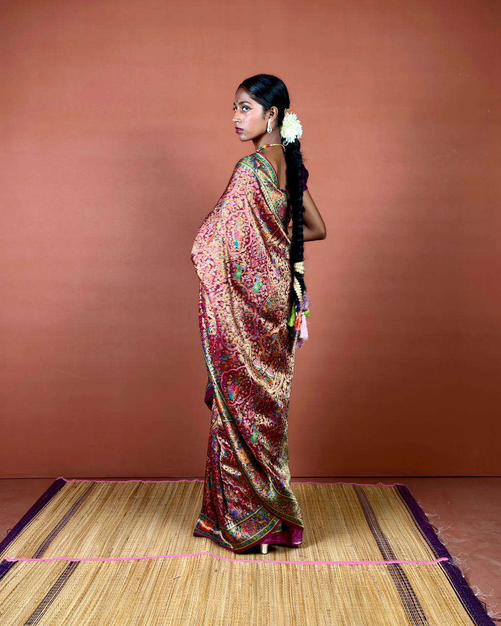 Maroon Banarasi Silk Saree with Gold Zari Jaal and Emerald Border